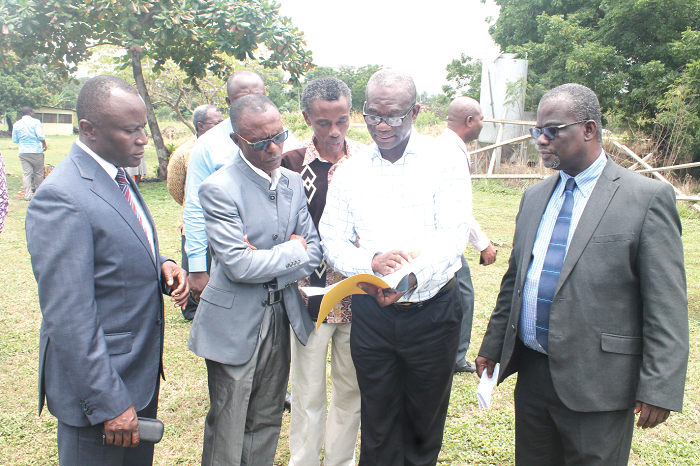  Mike Yaw Osei-Atweneboana (3rd left), Head of Environmental Biology and Health, CSIR, going over documents with Prof. Robert Kingsford-Adaboh (2nd left), Dr Victor Kwame Agyeman (left) and Prof. Osmund Ansa-Asare (4th left) Picture: Maxwell Ocloo