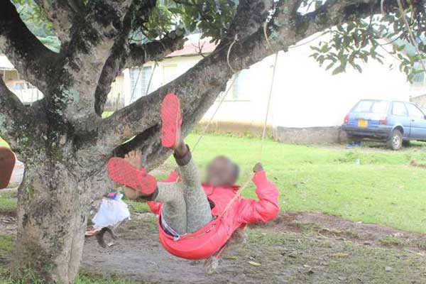 A child plays on a swing made of rope in this picture taken on August 12, 2017. A two-year-old boy is said to have died in a swing accident in Makueni.