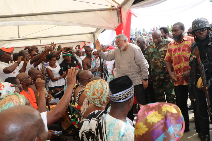 Former President Rawlings greeting chiefs on his arrival at the function