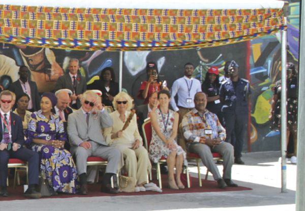 DJ Switch entertaining the invited guests. They include the Second Lady, Mrs Samira Bawumia (left), Prince Charles (second left) and Camilla (middle).