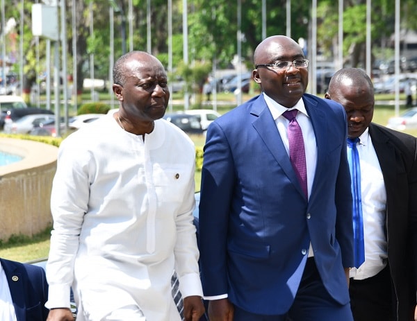 Mr Ken Ofori-Atta (left), the Minister of Finance, and Vice-President Mahamudu Bawumia on their way to Parliament yesterday. 