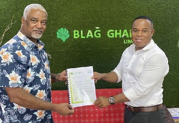 Capt. Ahmed Bedwei (left) displaying the contract with Mr Eddie Dankwa of BLAG Ghana