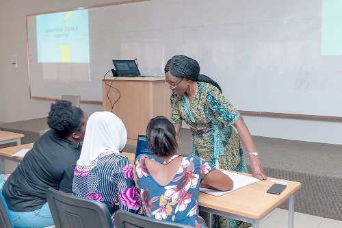 Dr Enyonam C. Kudonoo engaging some students at Ashesi University  