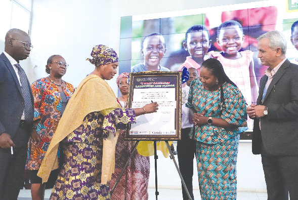 Hajia Lariba Zuweira Abudu (3rd from left), Minister Designate for Gender, Children and Social Protection signing the “I Will” Campaign. Looking on are Francisca Oteng Mensah (2nd from right), Chairperson, Parliamentary Select Committee on Gender and Children and other guests Picture: EDNA SALVO-KOTEY