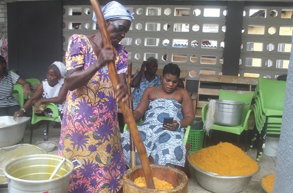 Some women preparing ‘Kpokpoi’, the traditional meal for the festival. Picture: ESTHER ADJORKOR ADJEI