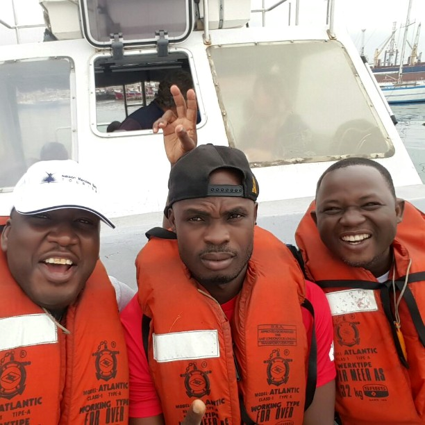 Mohammed  Ebenezer and Francis on the boat to watch whales and dolphins