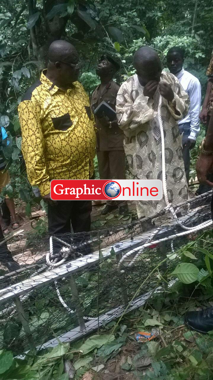 The collapsed canopy. Mr. Boasiako Sekyere, Eastern Regional Minister being briefed on the incident by Mr. Asare. Picture by George Folley