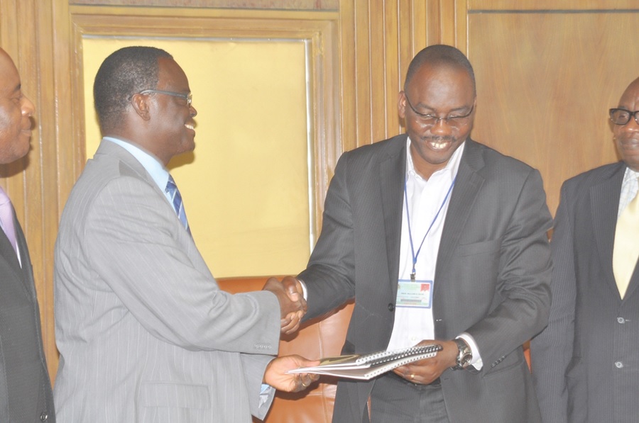 • Prof. W. O. Ellis (right), the Vice Chancellor of KNUST, exchanging files with Rev. Dr Peter Ohene Kyei (left), Rector of Pentecost University College, after the agreement.