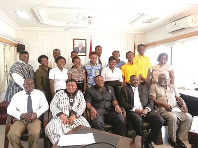   The Minister for Youth and Sports, Mr Elvis Afriyie Ankrah (seated middle), in a pose with the student cadets when they paid a courtsey call on him on Tuesday in Accra.