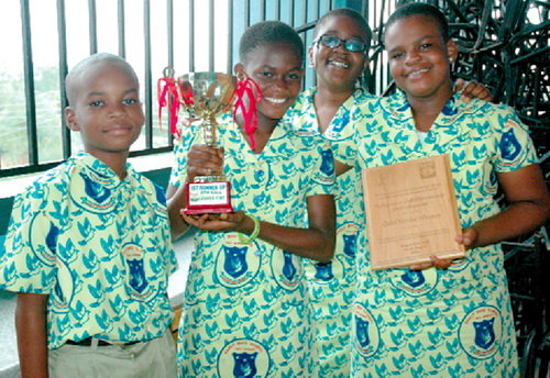 Happy students of Early Bird School display their prizes.  Picture: LYDIA ESSEL-MENSAH