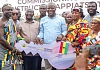 Vice-President Bawumia (2nd from left) and Samuel Abu Jinapor (middle) handing over a symbolic key to the houses to Nana Atta Kojo Brembi (2nd from right) and other chiefs