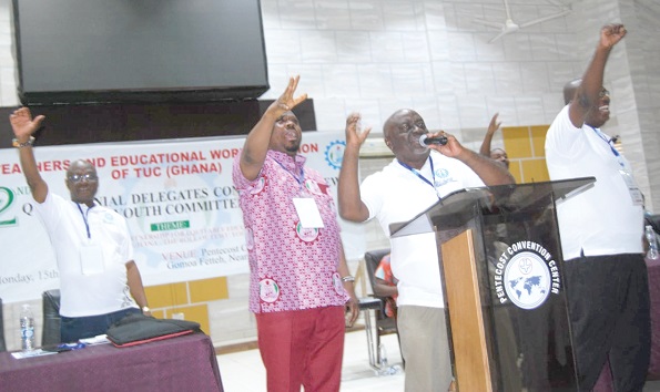 Mark Dankyira Korankye (with mic), General Secretary of TEWU, leading the charge at the conference
