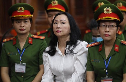 Vietnamese property tycoon Truong My Lan (C) looks on at a court in Ho Chi Minh city, April 11, 2024, where she was sentenced to death in one of the country's biggest fraud cases, with damages estimated at $27 billion.