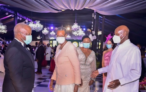 Amama Mbabazi (L) receives President Museveni and his wife Janet Kataha at his 50th marriage anniversary with Jacqueline Mbabazi on Saturday at Serena Hotel, Kampala. 