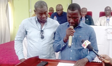 Yussif Otumba (right), NDC Bawku Central Communication Officer, reading out the communique. With him is Nurudeen Gumah (left), NPP Bawku Central Communication Officer