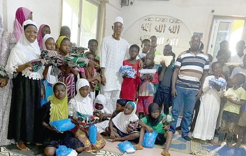 Alhaji Ishmaela Ibrahim with some of the beneficiary children