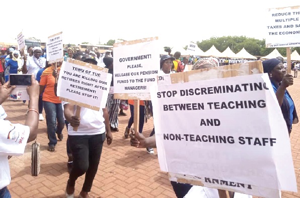 Workers in Tamale displaying placards to express their concerns