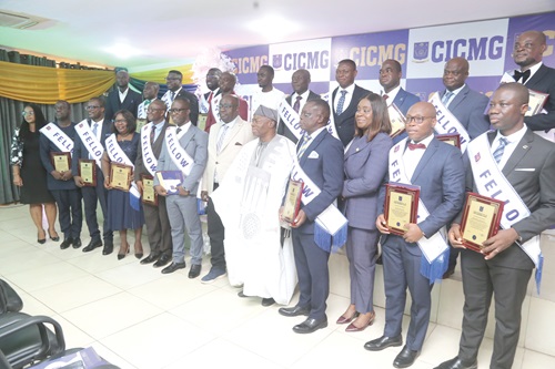  Naa Alhassan Andani (5th from right), former CEO, Stanbic Bank, and Dr Tony Aubynn (6th from right), Board Chairman, Apex Bank, with some of the fellows after graduating from the Institute of Credit Management in Accra. Picture: SAMUEL TEI ADANO