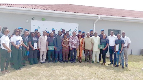 Samuel Quartey (arrowed), Technical advisor to the Minister for Fisheries and Aquaculture Development, with some dignitaries, trainers and trainees 