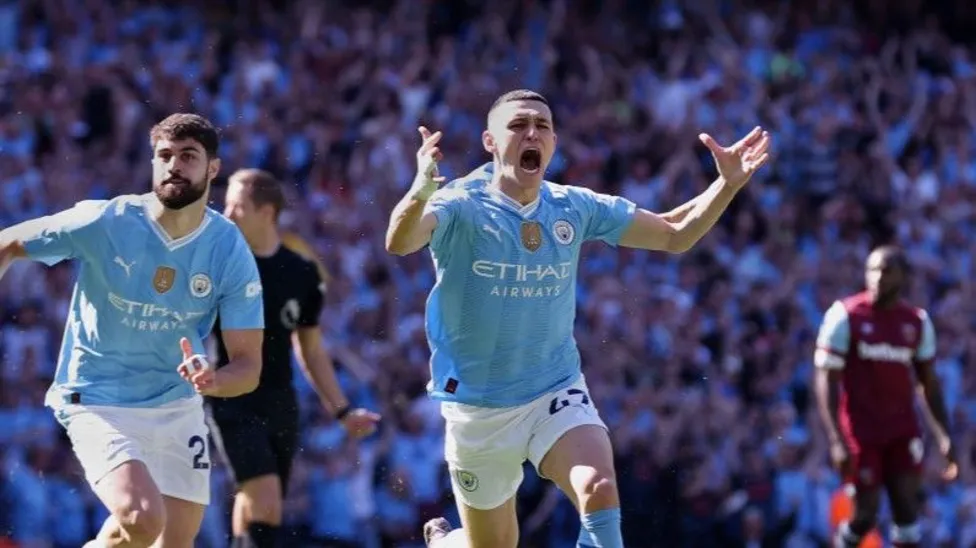 Phil Foden continued his superb season with the opening two goals for history-makers City
