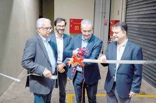 Hakim Ouzanni (middle), MD, SG Ghana; Francois Pousse (left), Deputy MD, SG Ghana; Mahesh Melwani (right), Group Joint MD, Melcom, and Ramesh Sadhwani, Group Joint MD, cutting the tape for the lauch of the solar power systems