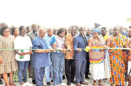 Sections of the recycling plant. Inset: Lydia Seyram Alhassan (arrowed) Minister designate for Sanitation and Water Resources, being assisted by other dignitaries and stakeholders to perform the commissioning ceremony