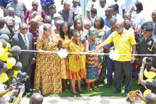 Prof. Franklyn Manu (2nd from right) and other dignitaries cutting the ribbon to officially open the building