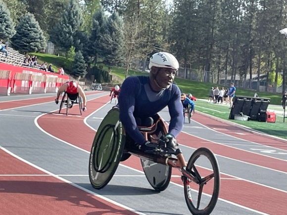 Botsyo Nkegbe racing to the finish line on the track