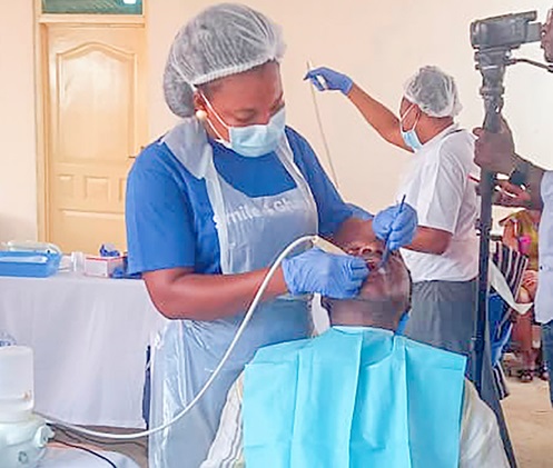 A surgeon from Smile 4 Ghana working on a patient