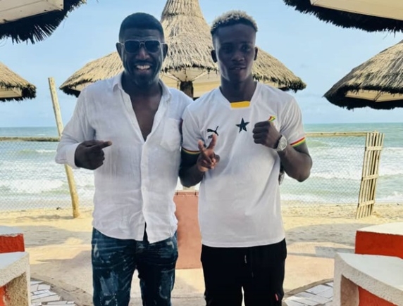 Samuel Takyi (right) and his new manager, Michael Amoo-Bediako 