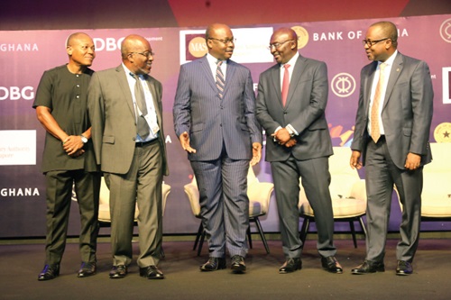 Vice-President Dr Mahamudu Bawumia (2nd from right) interacting with Dr Ernest Addison (3rd from left), Governor of the Bank of Ghana, after the morning session of Day Two of the 3i Africa Summit in Accra. With them are Dr Maxwell Opoku-Afari (right), First Deputy Governor, Bank of Ghana, and other stakeholders. Picture: SAMUEL TEI ADANO