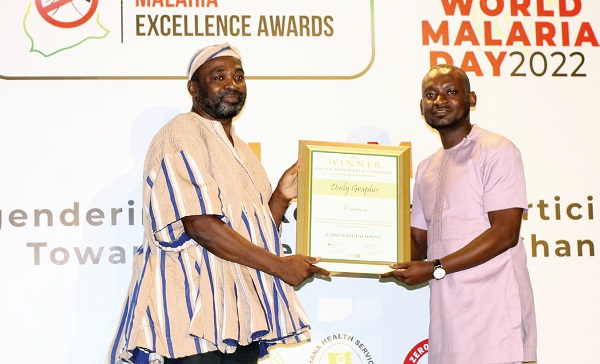 Shadrach Kankam (right), an Assistant Web Designer at GCGL, receiving a citation on behalf of Zadok Gyesi for winning the Print Newspaper Category in Excellence in Malaria Reporting from Andrew Saibu, African Regional Coordinator, Innovative Vector Control Consortium. Picture: MAXWELL OCLOO
