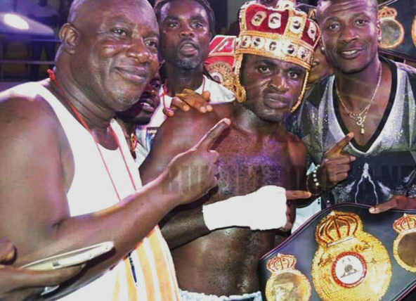 The late Akese (left) celebrates a recent victory with his boxer Emmanuel Tagoe and his manager Asamoah Gyan (right)