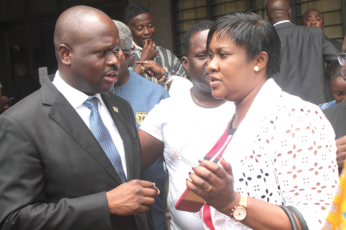Dr Edward K. Omane Boamah (left), the Minister of Communication, explaining a point to Madam Francisca Ashietey-Odunton (right), Ag. Director General (GBC) and Vice Chairman of the Steering Committee, after  the ceremony. Picture: EDNA ADU-SERWAA