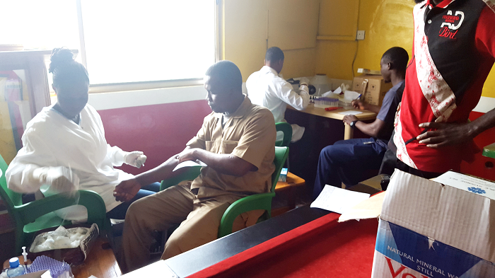 Some of the workers being screened