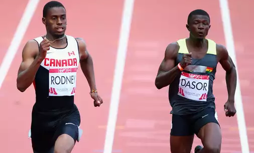 Emmanuel Dasor on the right— Failed to go past the 200m heats yesterday
