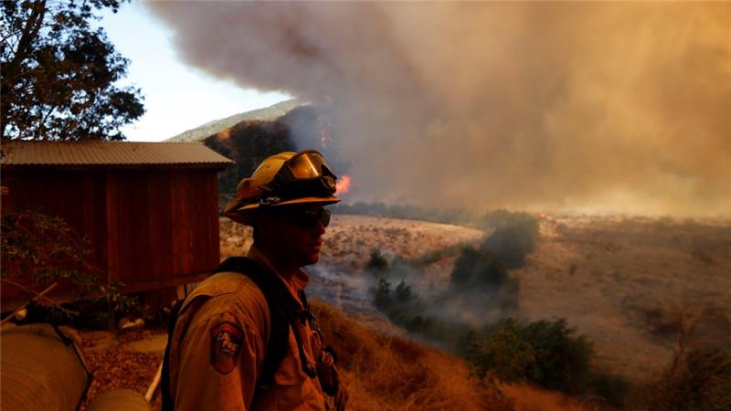 Wildfires in the US force 82,000 to flee their homes