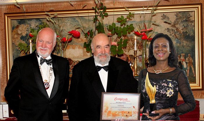 Mrs Quartey-Papafio with two officials of the Europe  Business Assembly at the ceremony.