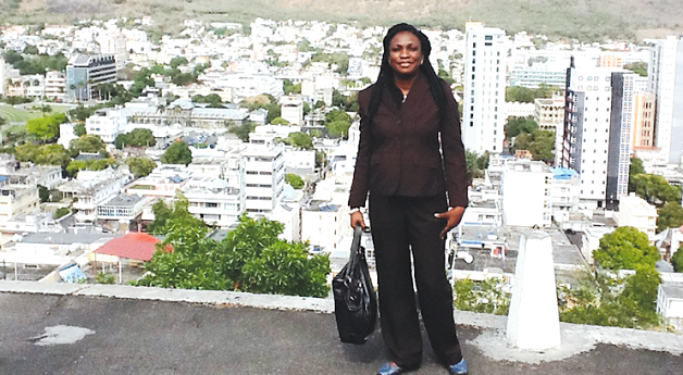 Mrs Gifty Opoku Agyemang posed on a hill, 100 metres above sea level which overloooks Port Louis, the capital of Mauritius
