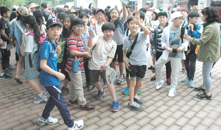  Some schoolchildren in South Korea leaving the National Museum  after their visit to the place. Picture: SAMUEL TEI ADANO