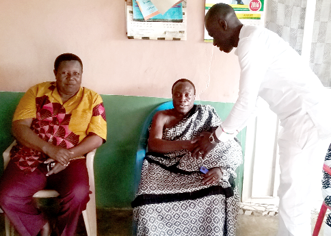 The Nhyiaeso Parliamentary Candidate for the PPP, Kofi Debrah Afrifa, in a handshake with the Santasehene, Nana Amoako Kese, when he paid a courtesy call on him at Santasi
