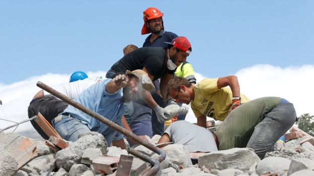  Some rescuers have been using their bare hands to sift through debris 