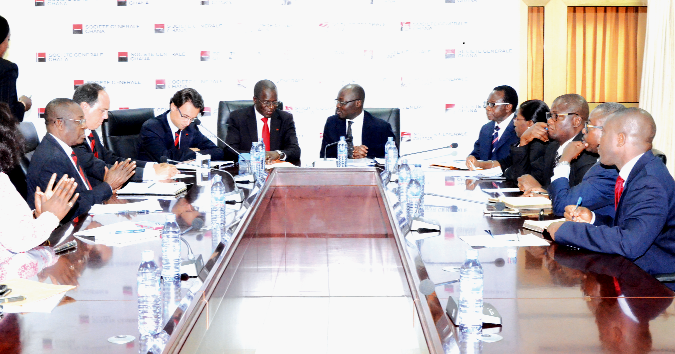 Mr Casiel Ato Forson, Deputy Minister of Finance and Mr Sionle Yeo, Managing Director of Societé Generalé, both at head of table, in a discussion during the signing ceremony.