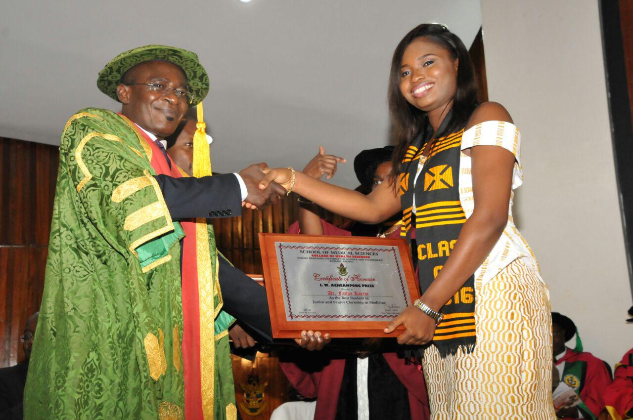 The Vice Chancellor, Prof. Kwasi Obiri Danso (left), presenting the Overall Best Student award to Dr Fathia Karim