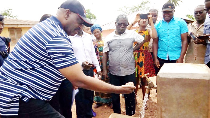 Dr Kwaku Agyeman-Mensah, trying his hand on a standpipe. Picture: Akwasi Ampratwum-Mensah,