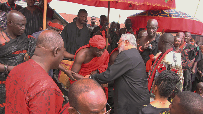  President Rawlings exchanges pleasantries with Nana Opese Konadu III, acting President of the Nifa Traditional Council and Chief of Awukugua