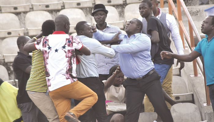 Angry Kotoko fans in scuffle with one of the reporters. Picture EMMANUEL BAAH