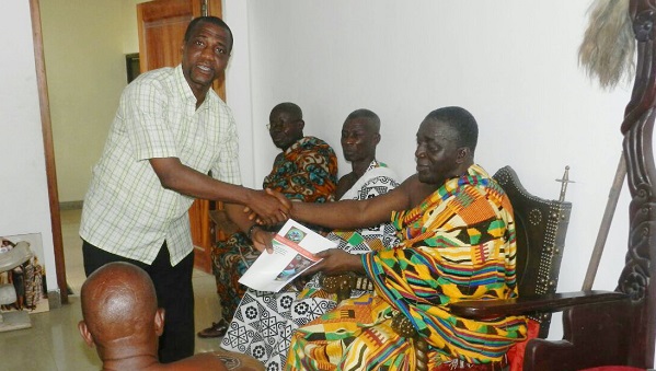 Mr Yeboah presenting his policy foundation document to Nana Kobina Nketsia V 