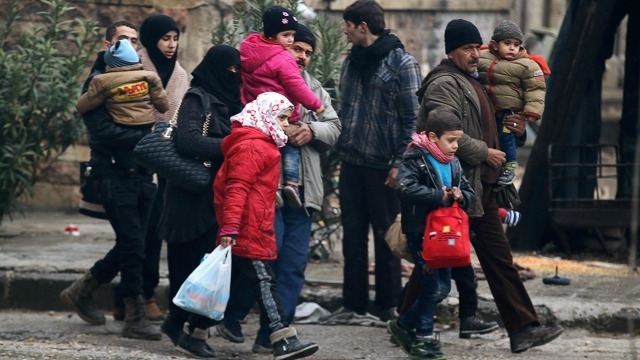 Aleppo battle: Evacuation continues as truce holds