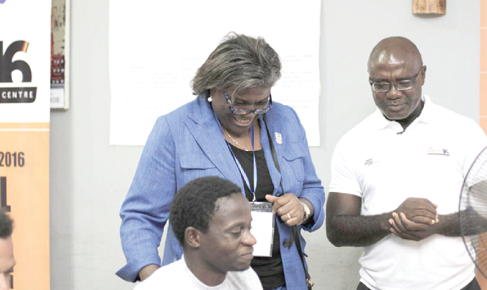  US Assistant Secretary of State for African Affairs, Linda Thomas-Greenfield, and Kwame Ahiabenu (right) during her visit to the Social Media Monitoring Centre